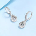 Silver-tone hoop earrings with teardrop halo stone drops