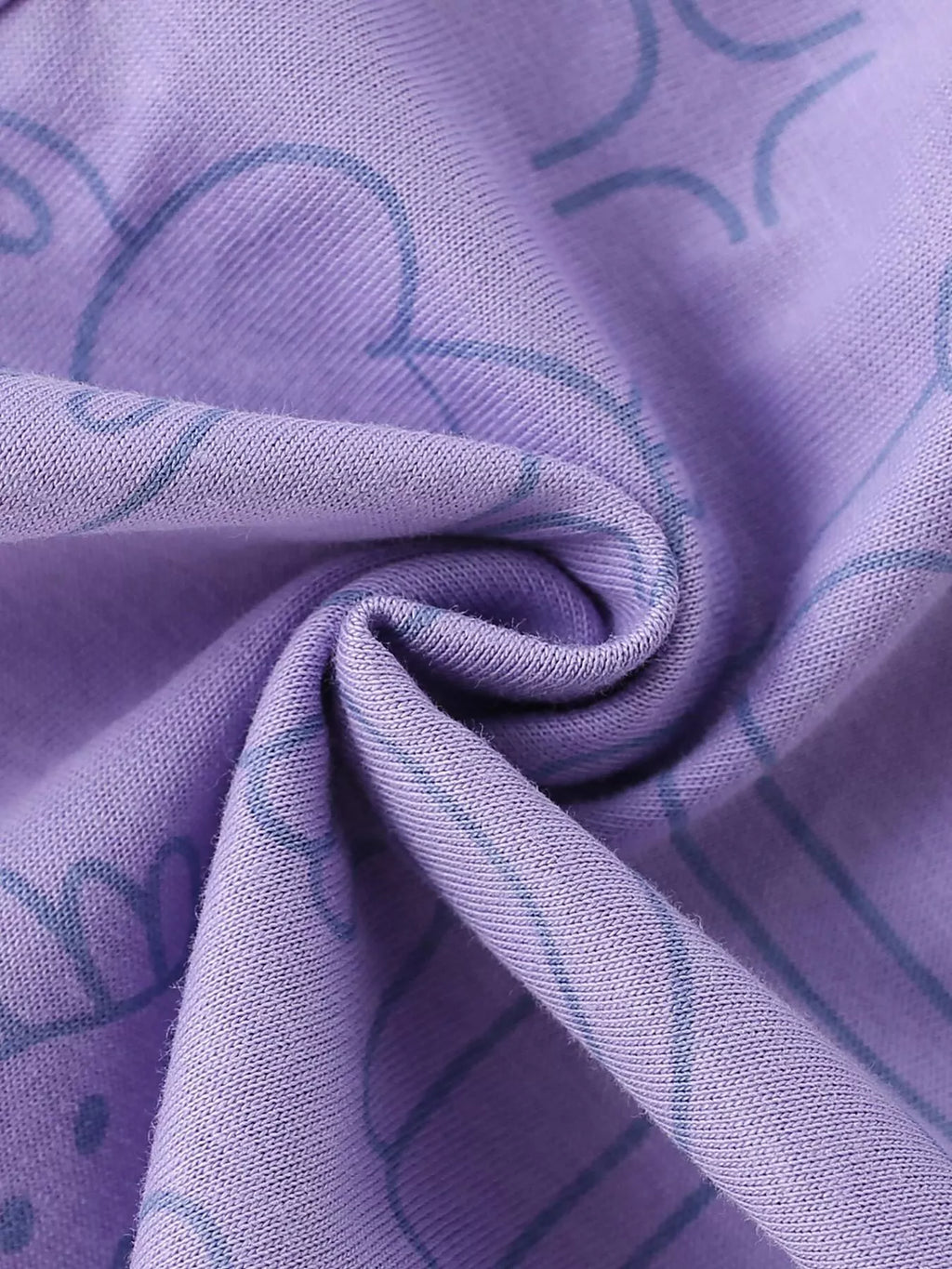 Purple fabric detail of the children’s cat sweatshirt