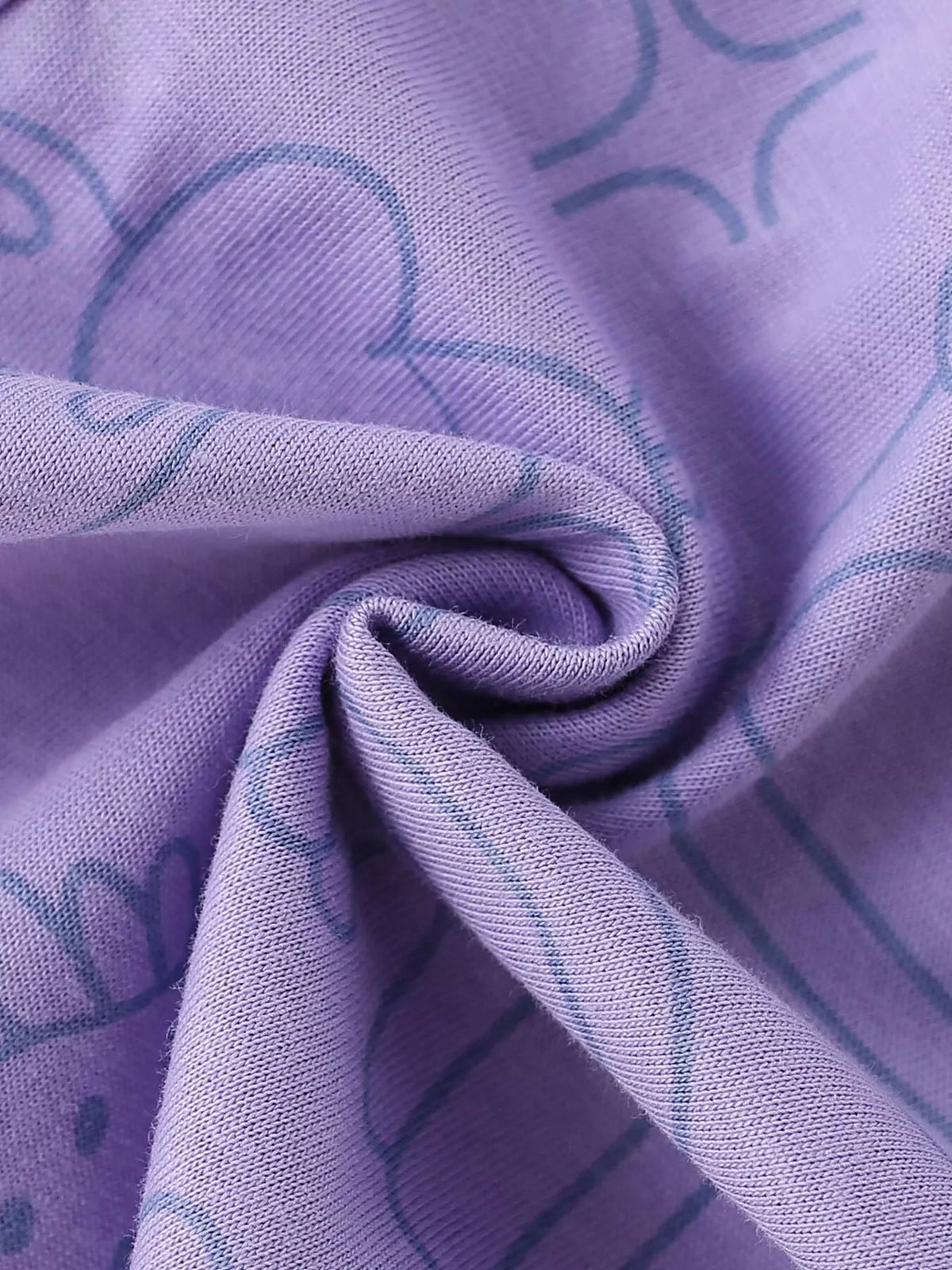 Purple fabric detail of the children’s cat sweatshirt