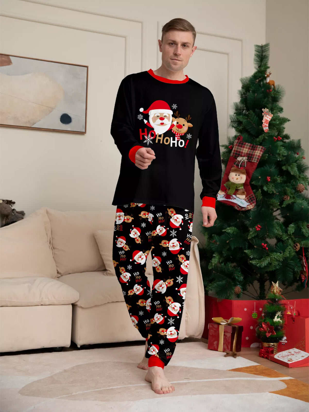 Front view of the men's black Ho Ho Ho Santa graphic pajamas.