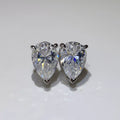 Silver-tone stud earrings with triangular clear stones — detail view