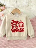 Cream children's sweatshirt with red Joy to the World lettering and a nativity graphic.