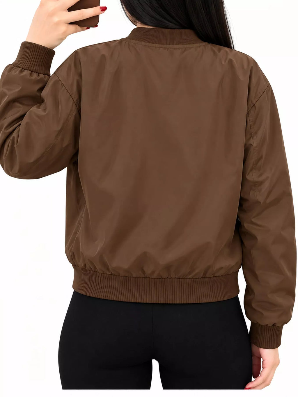 Back view of the brown bomber jacket and ribbed hem.