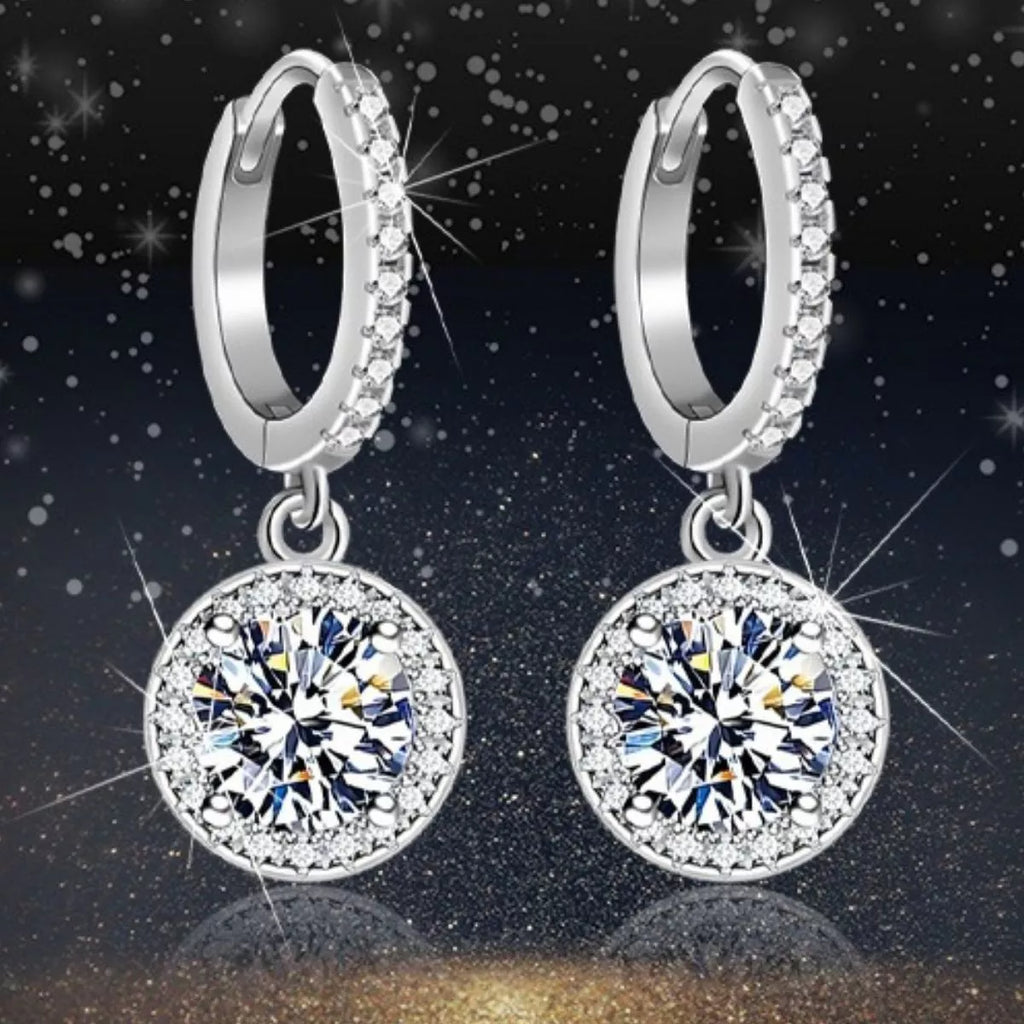 Silver-tone hoop earrings with round halo stone drops — detail view
