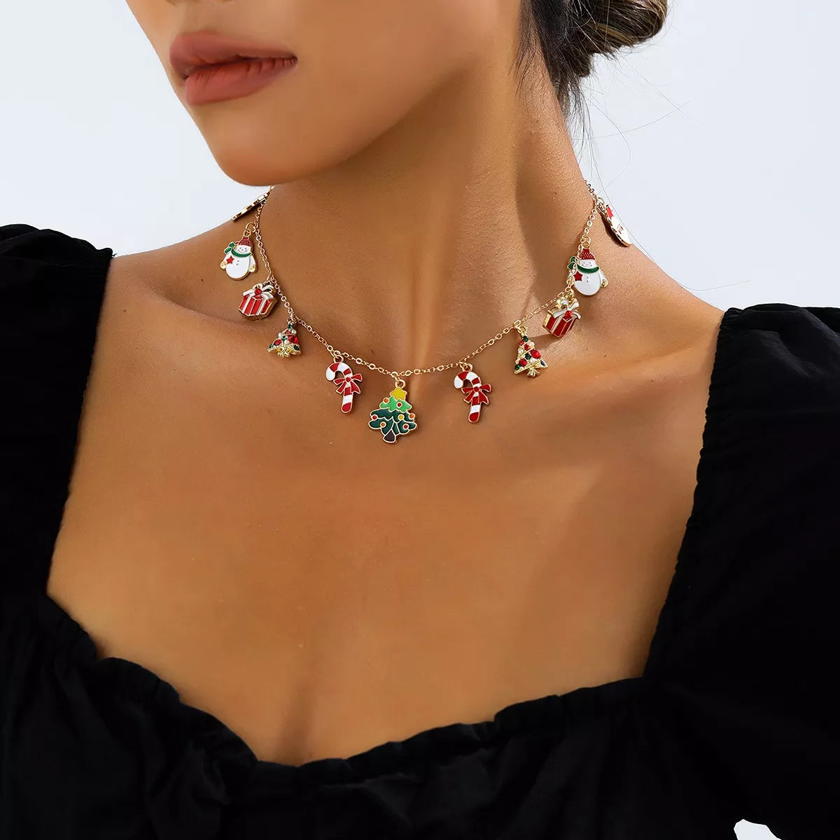 Gold-tone necklace with colorful Christmas charms
