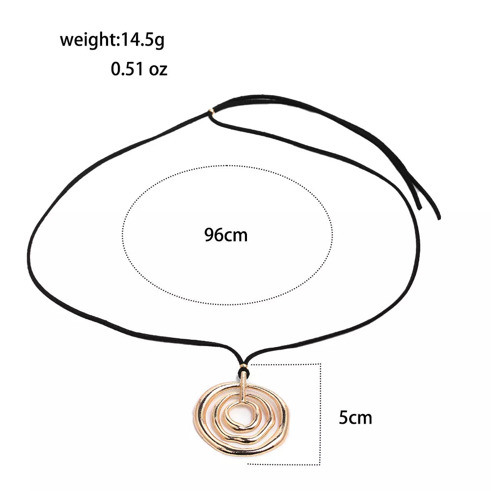 Measurements diagram for long black cord necklace with a round gold-tone spiral pendant