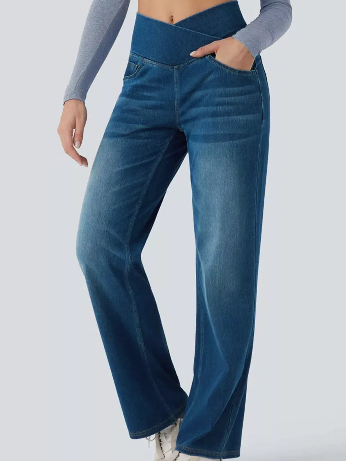 Blue high-waisted crossover waistband straight-leg jeans — detail view