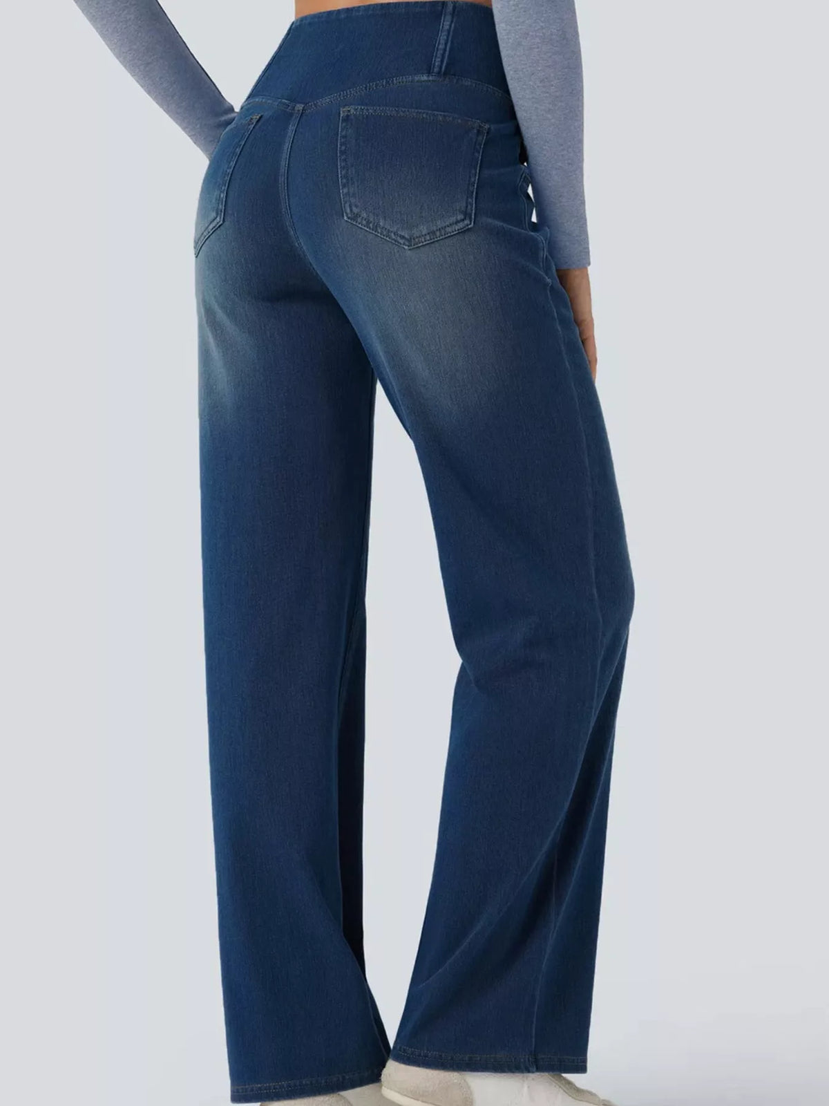 Dark blue high-waisted crossover waistband straight-leg jeans — back view