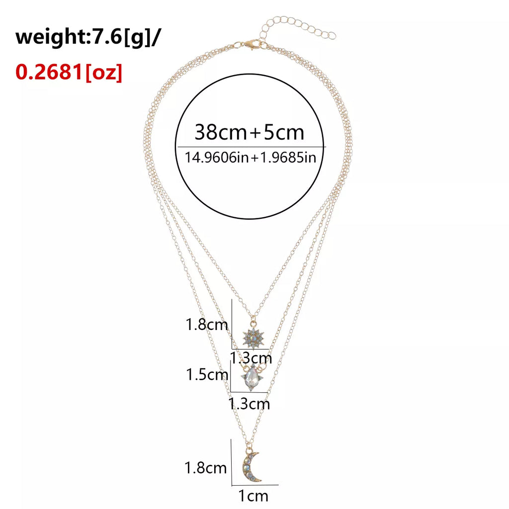 Measurements diagram for layered silver-tone necklace with celestial and clear stone charms