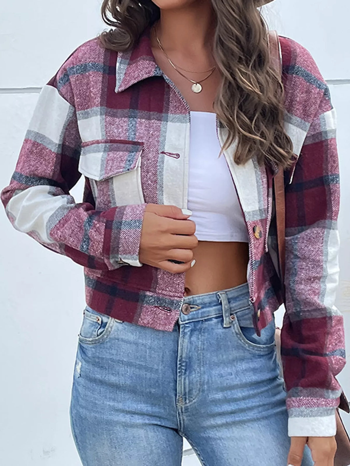 Burgundy color-block plaid cropped jacket with flap chest pockets, front view.