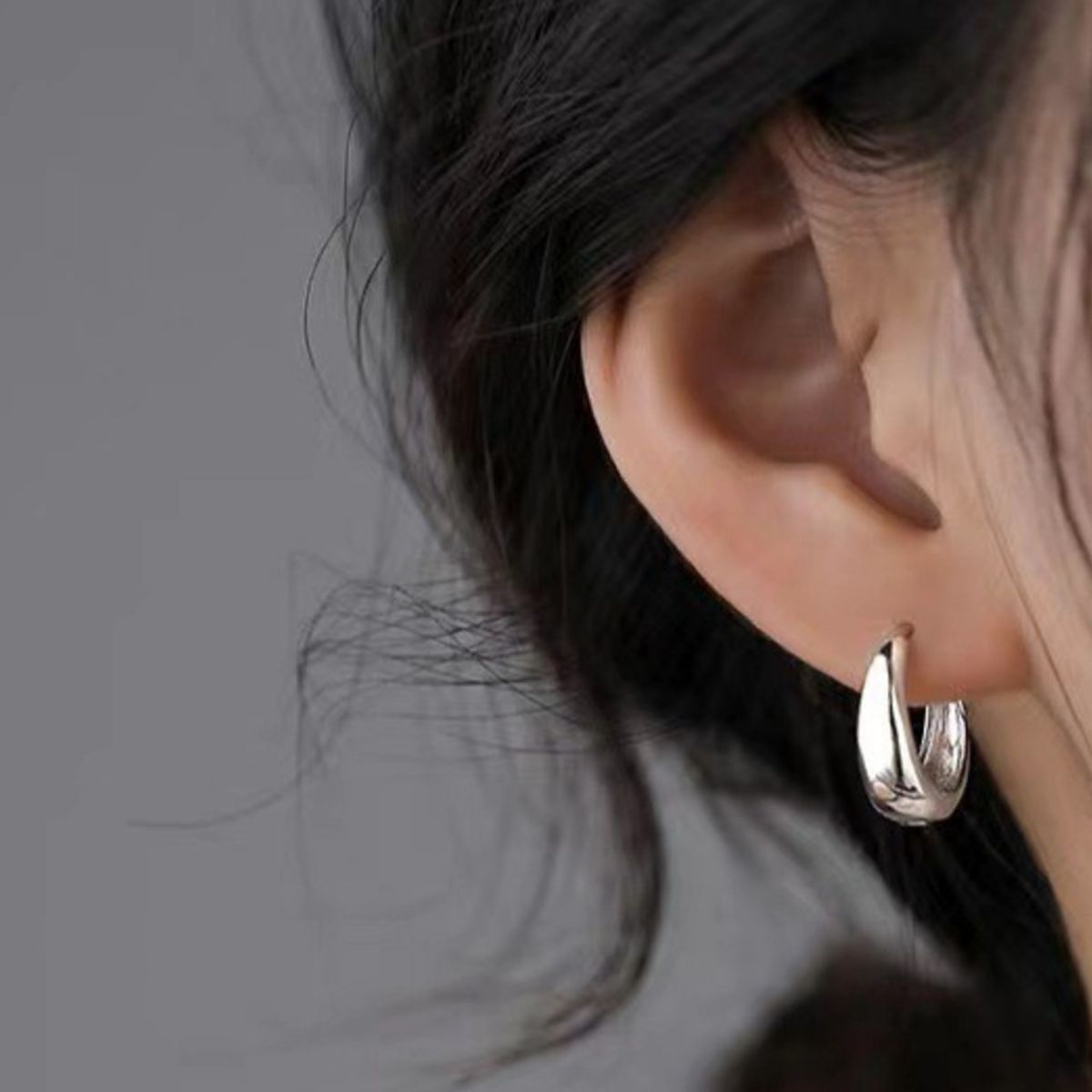 Rounded silver-tone hoop earrings