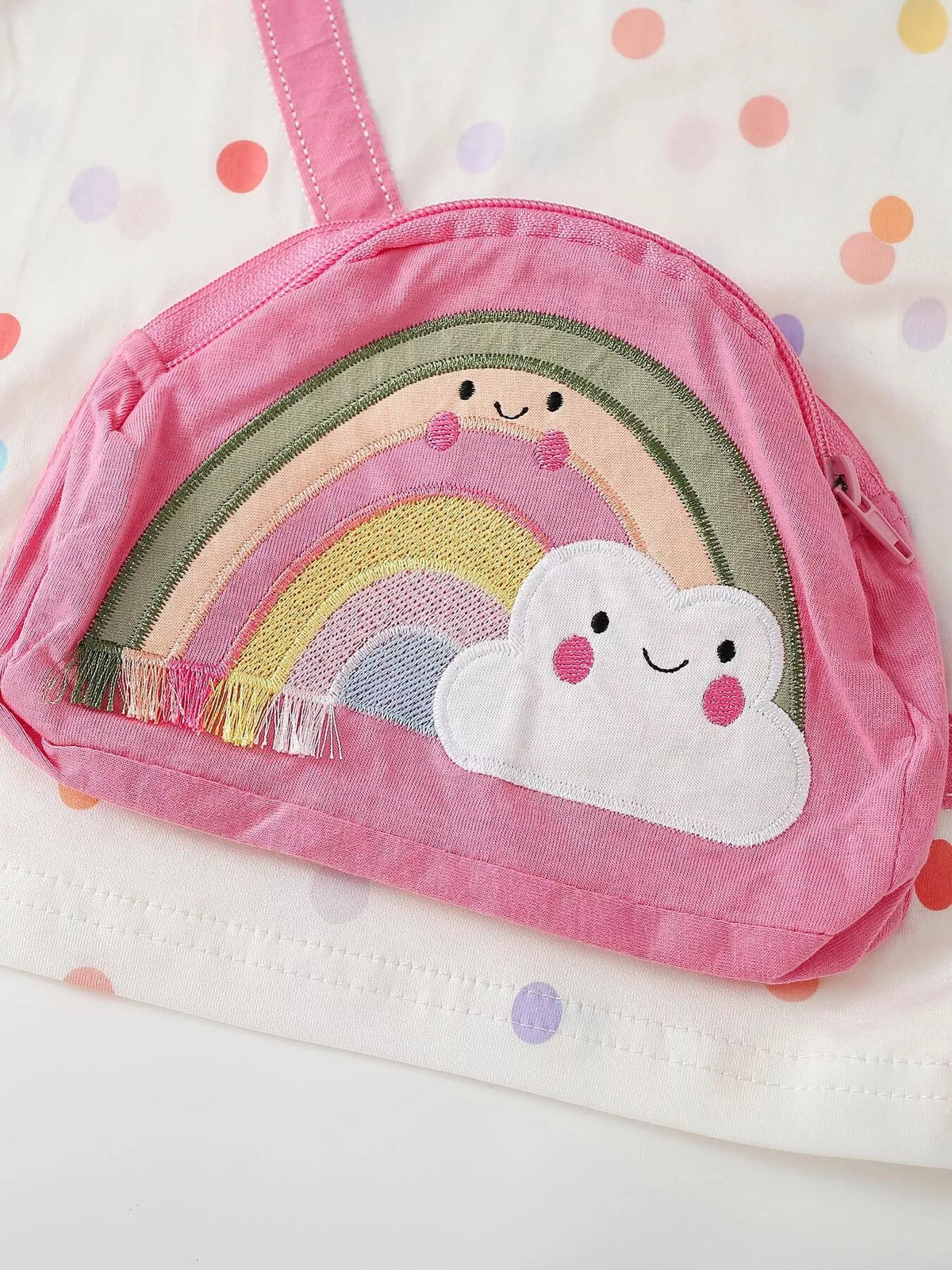 Pink rainbow and smiling-cloud bag applique on the white top