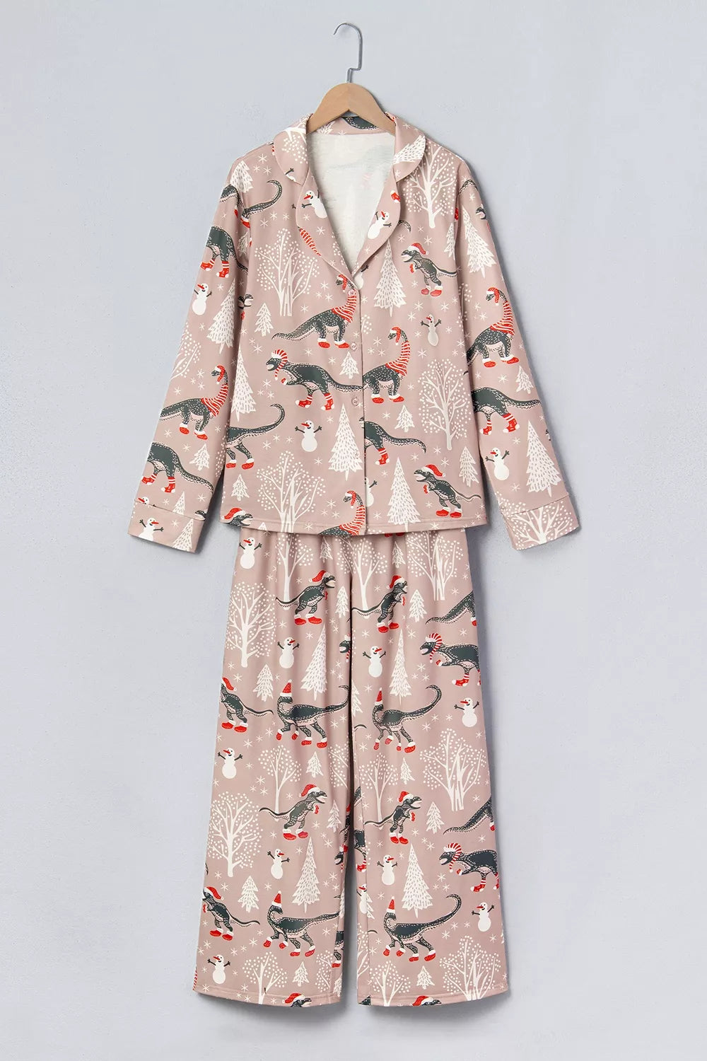 Pink long-sleeve pajama shirt and pants with dinosaur Christmas print