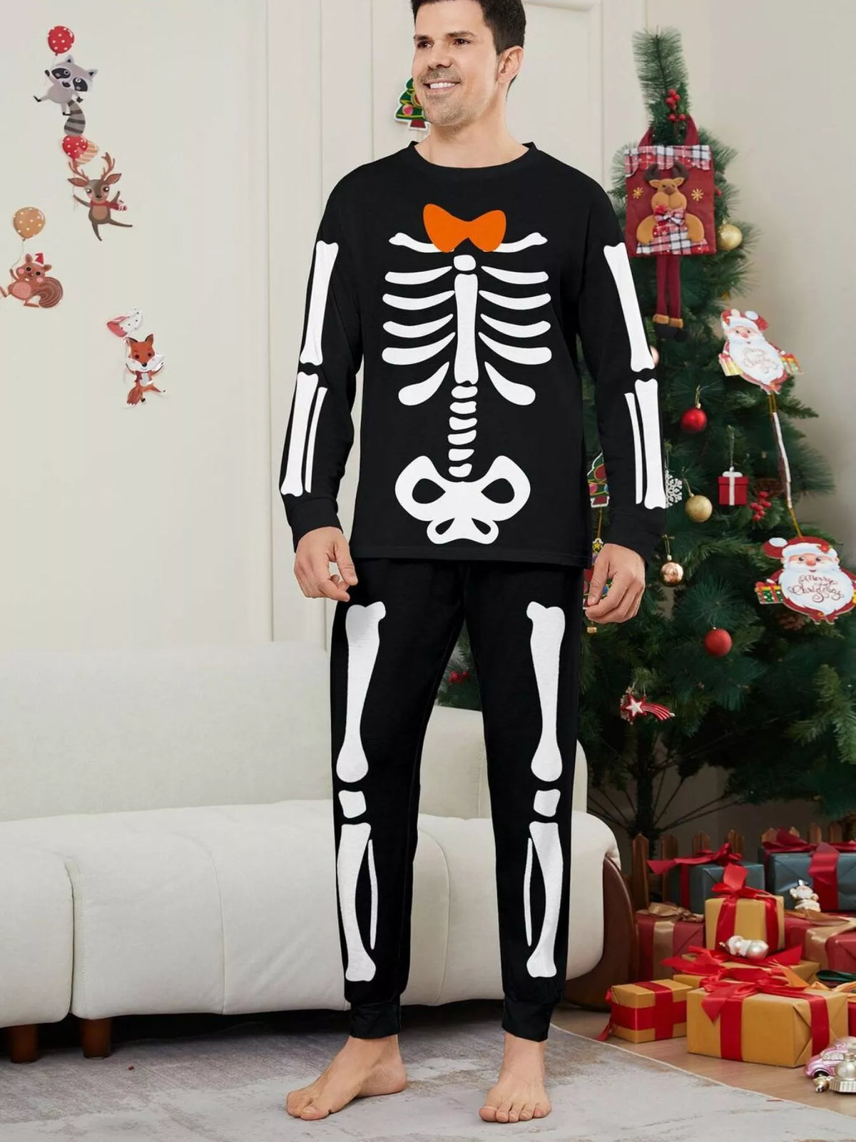 Front view of the men's black skeleton-print pajamas.