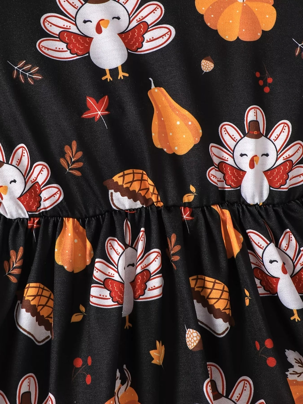 Turkey-print skirt and gathered waist of the black dress