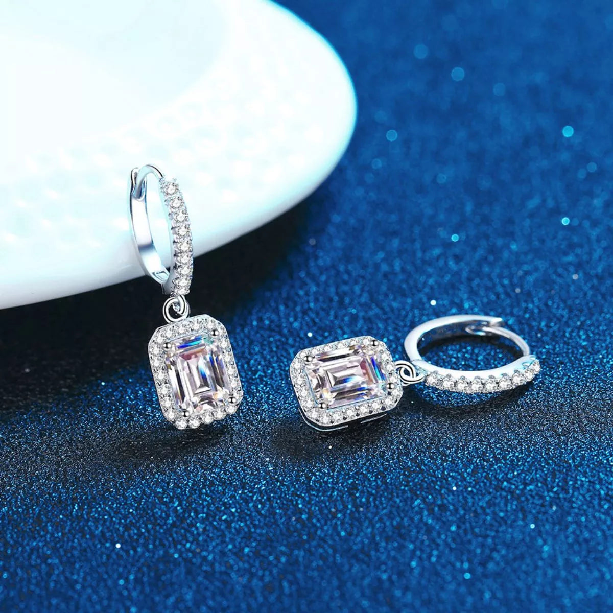 Silver-tone hoop earrings with rectangular halo stone drops — detail view