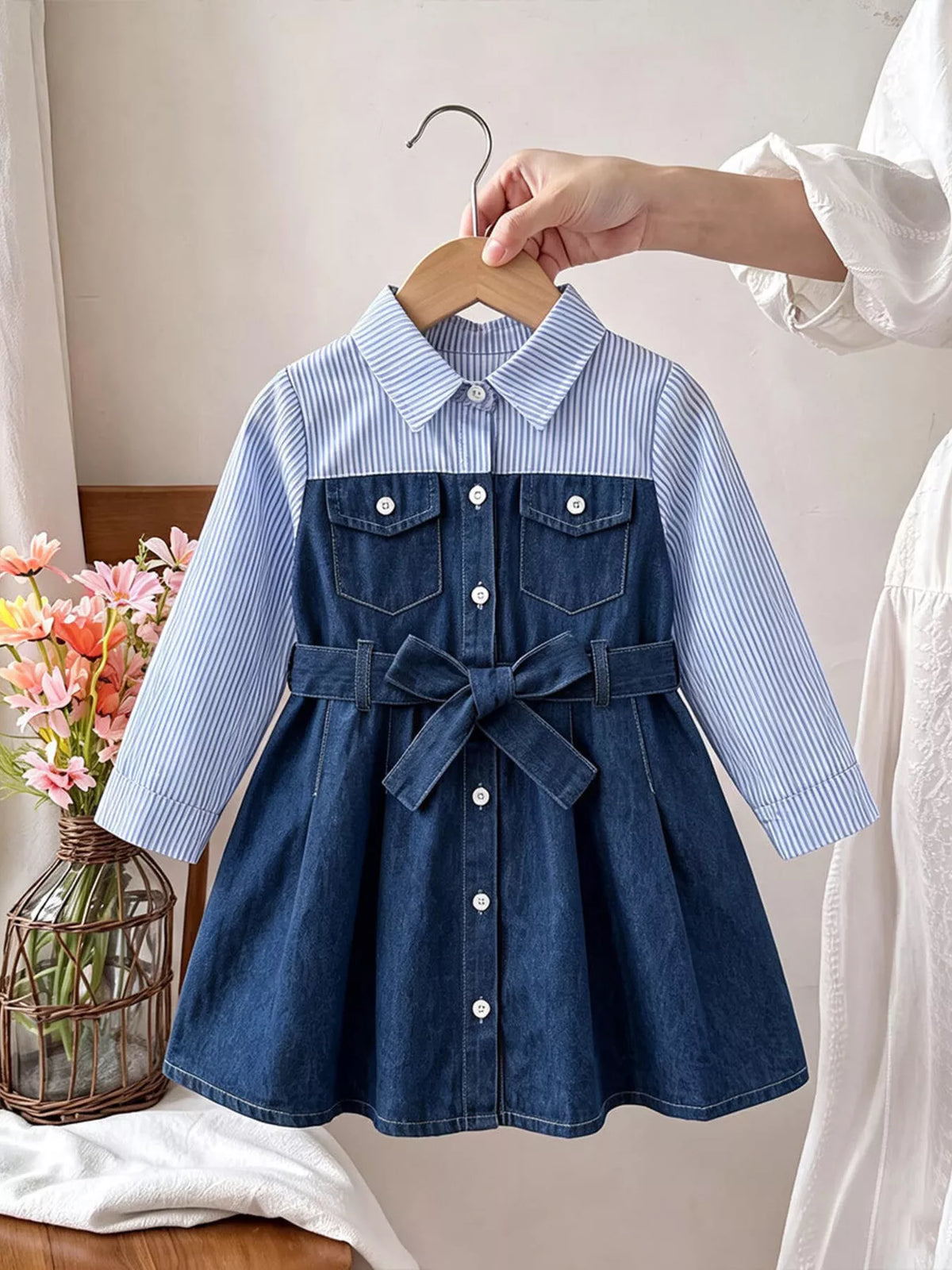 Children's blue button-front dress with striped collar and sleeves, denim-style skirt and waist tie.