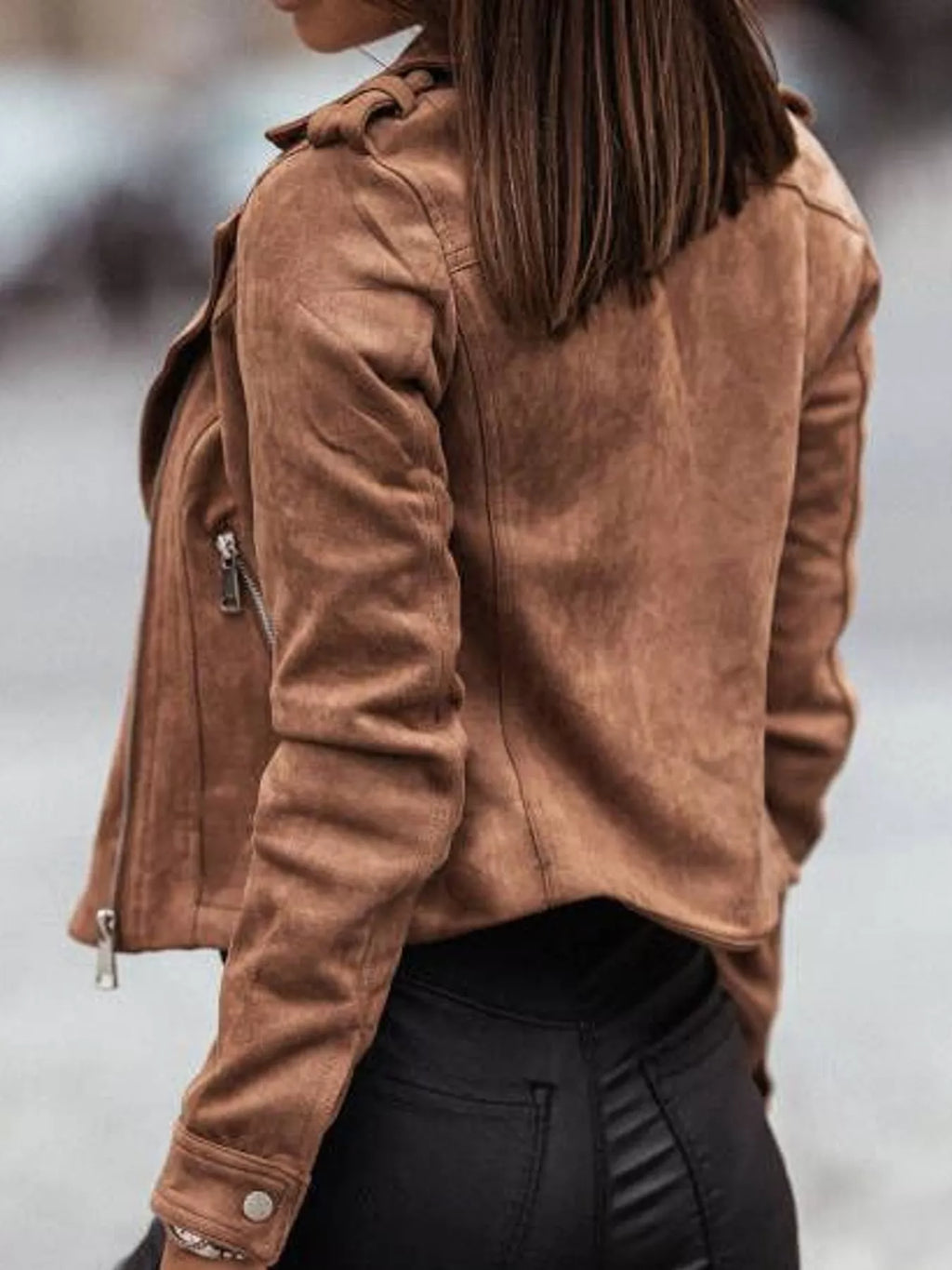 Back view of the khaki asymmetrical-zip jacket.