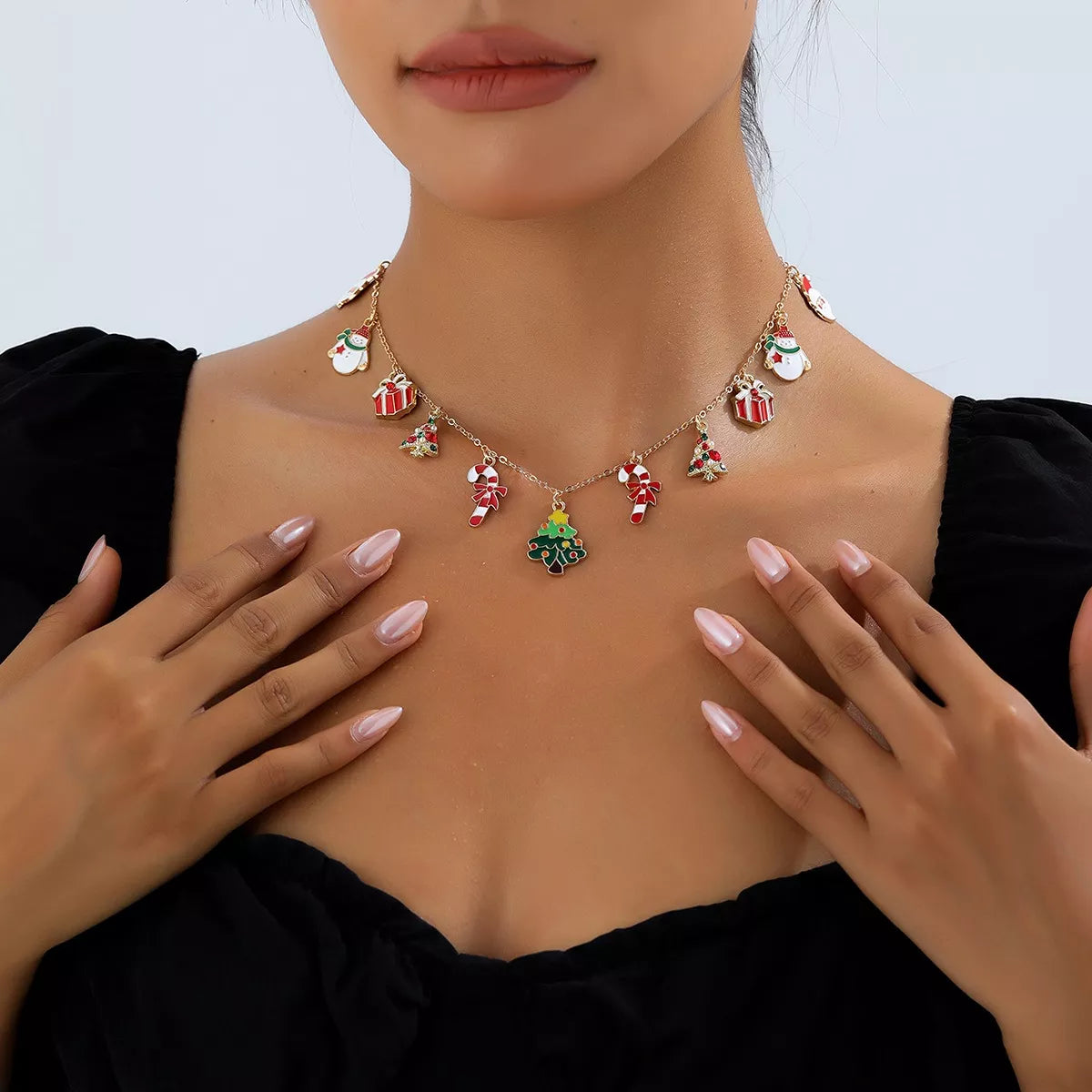 Gold-tone necklace with colorful Christmas charms