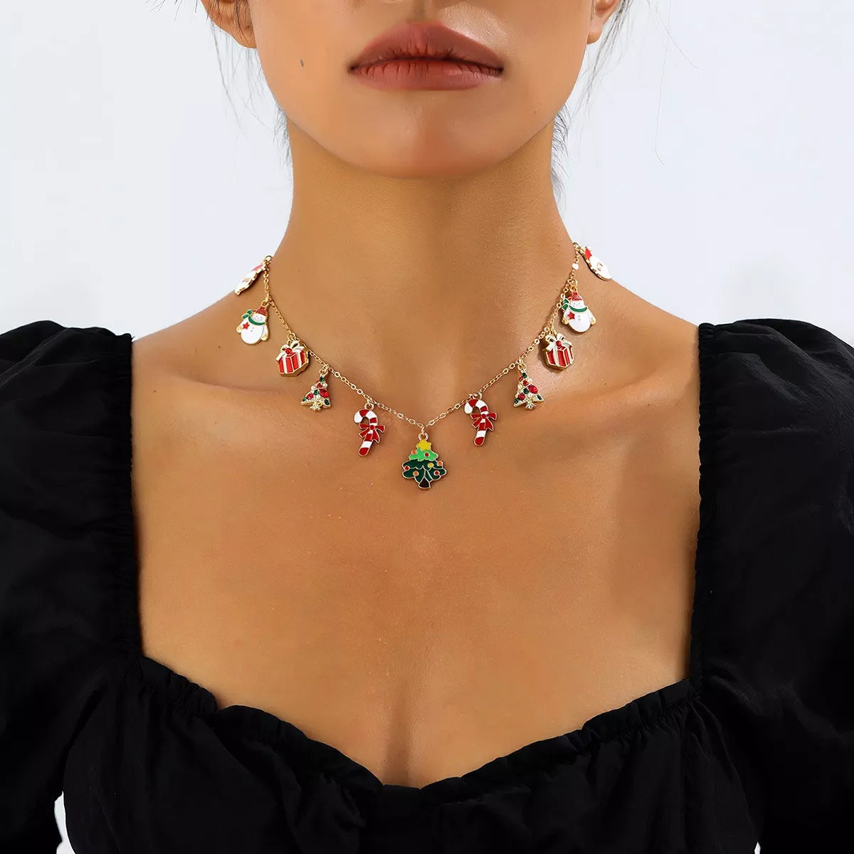 Gold-tone necklace with colorful Christmas charms