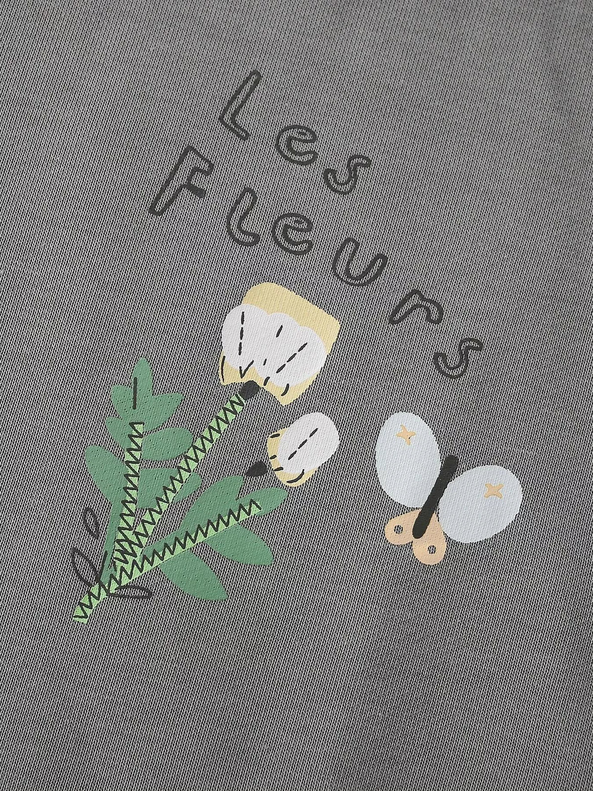 Les Fleurs lettering and small flower graphics on the gray sweatshirt