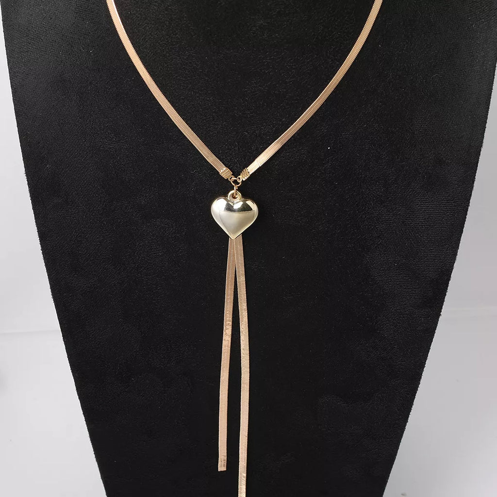 Gold-tone heart pendant lariat necklace with long chain tassels