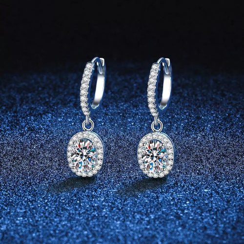 Silver-tone hoop earrings with oval halo stone drops
