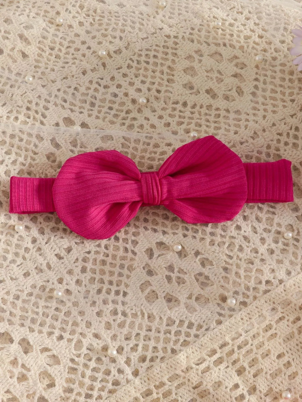 Hot pink ribbed bow headband