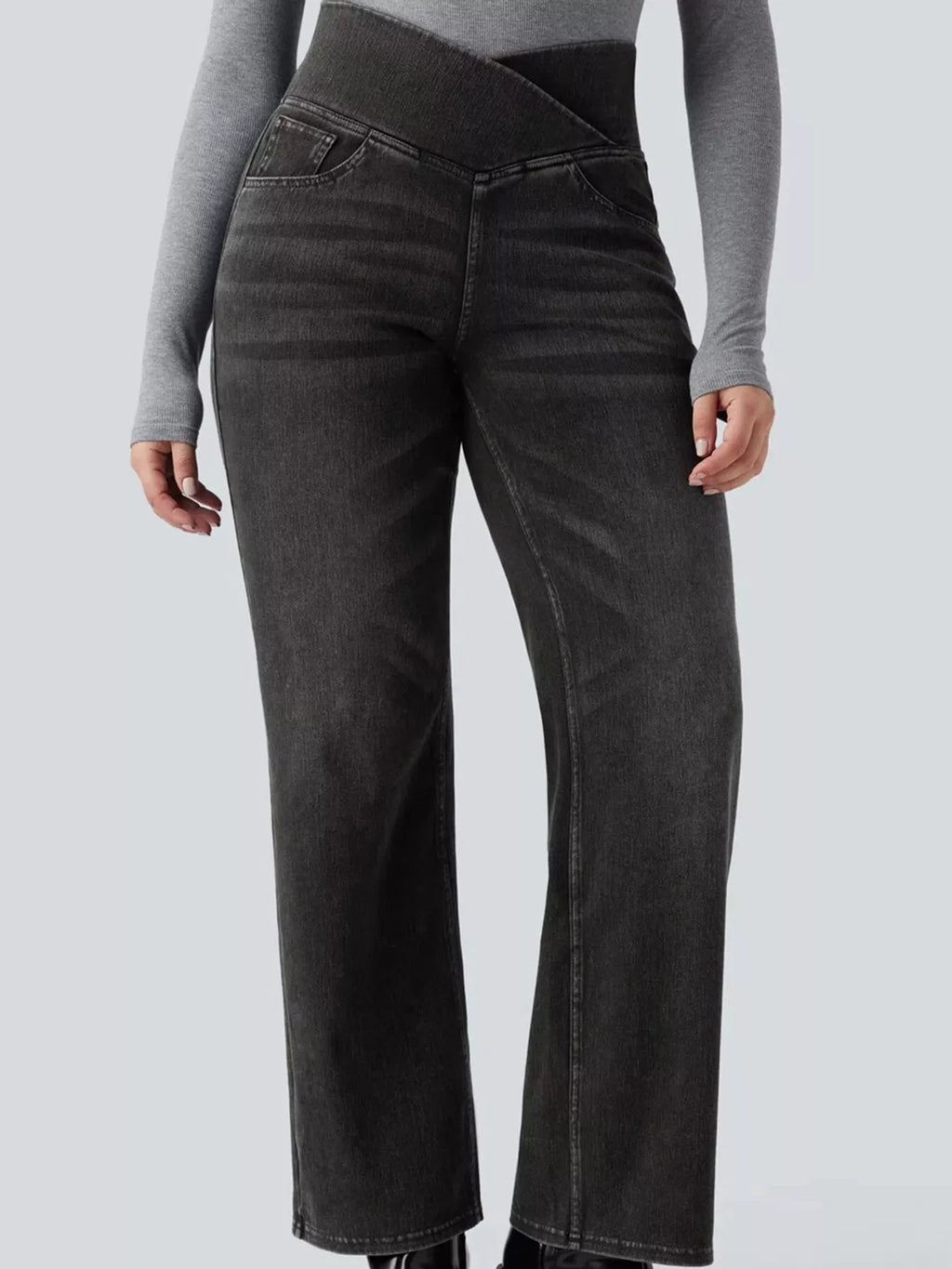 Black high-waisted crossover waistband straight-leg jeans — detail view