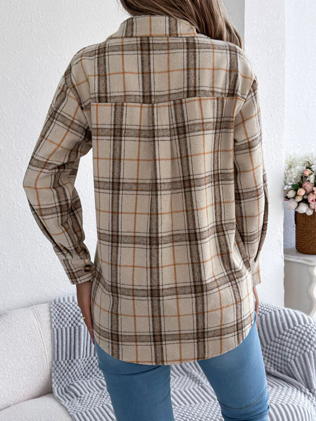 Apricot plaid button-down shacket with chest pockets, back view.