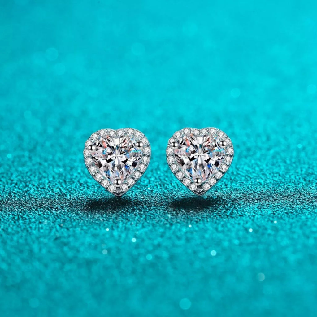 Heart-shaped clear stone halo stud earrings — detail view