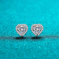 Heart-shaped clear stone halo stud earrings — detail view