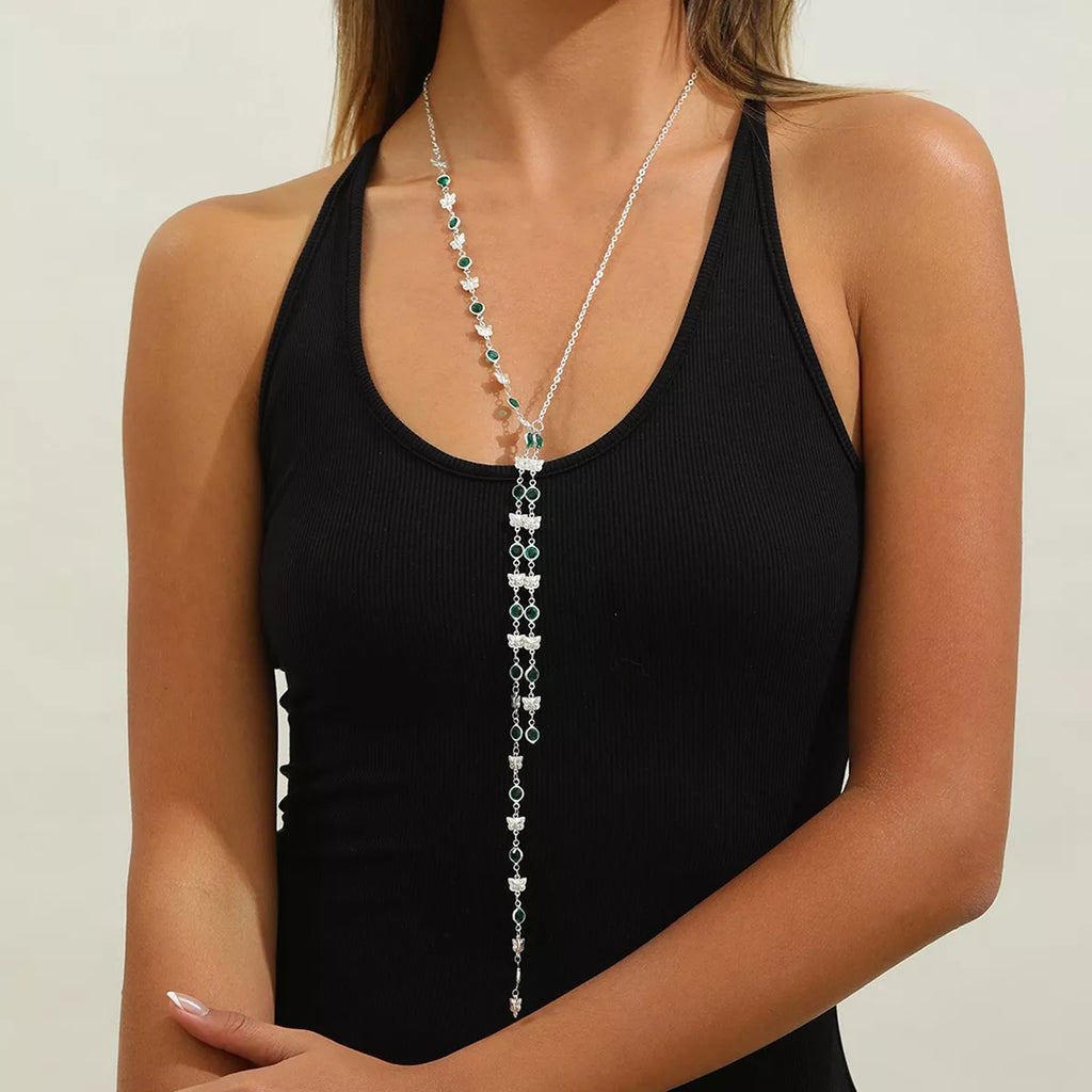 Long silver-tone lariat necklace with butterfly charms and green accents