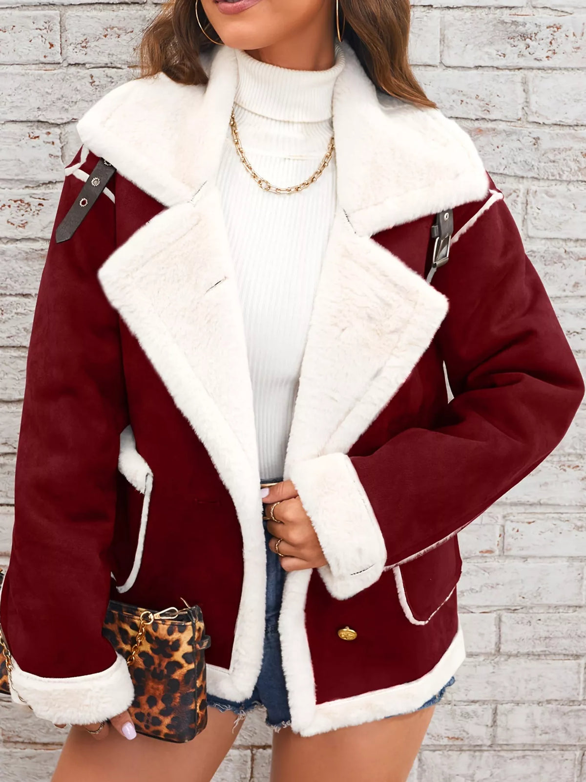 Crimson jacket with wide white plush lapels, contrast trim and front pockets, front view.