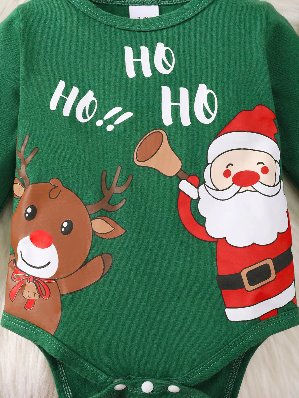 Close-up of Santa, reindeer and Ho Ho Ho lettering on the green bodysuit.