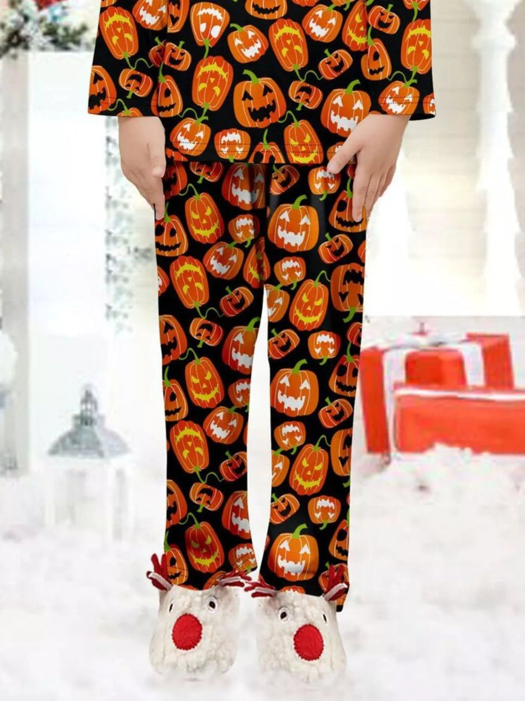 Close-up of the orange pumpkin-print pajama pants.