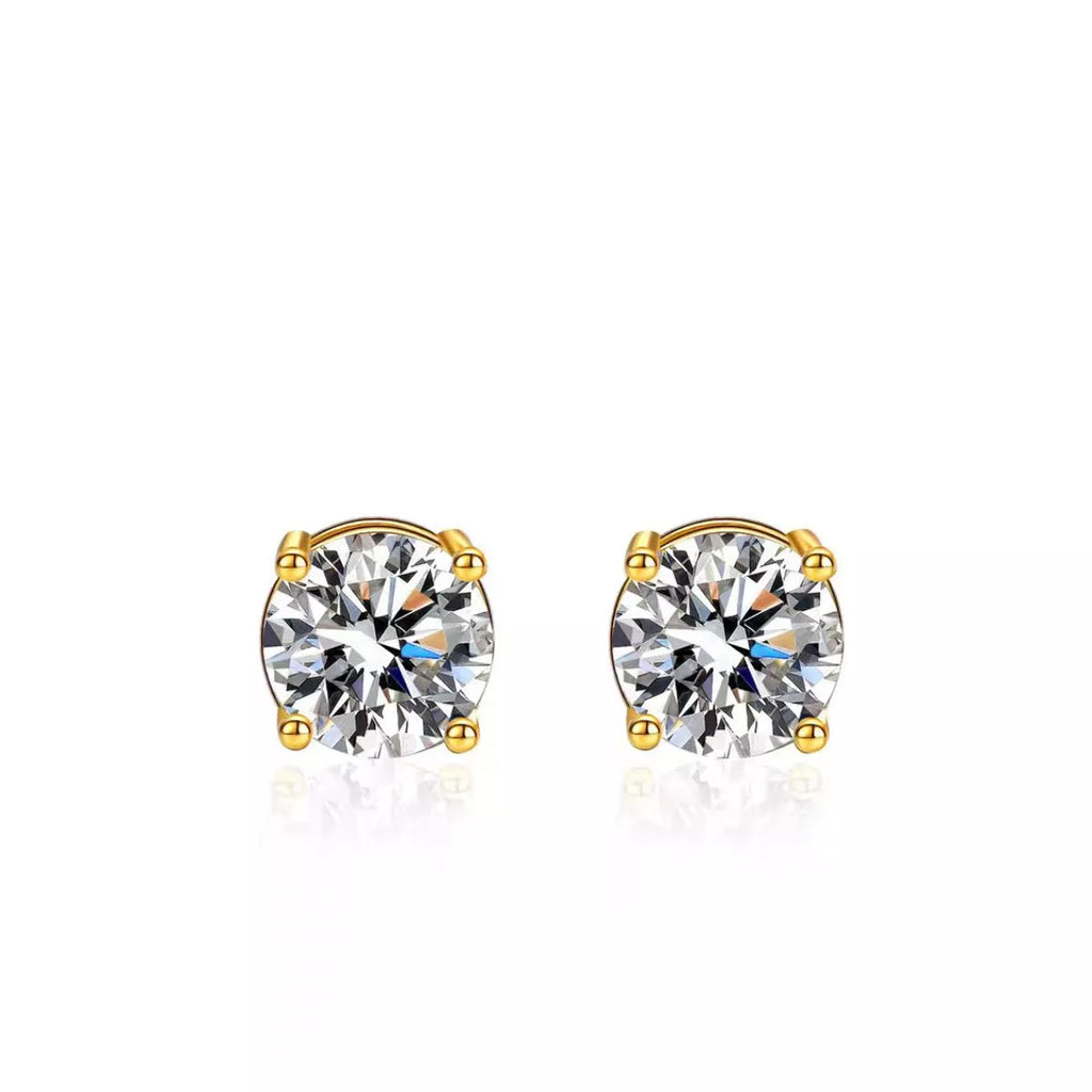 Gold-tone stud earrings with round clear stones — detail view