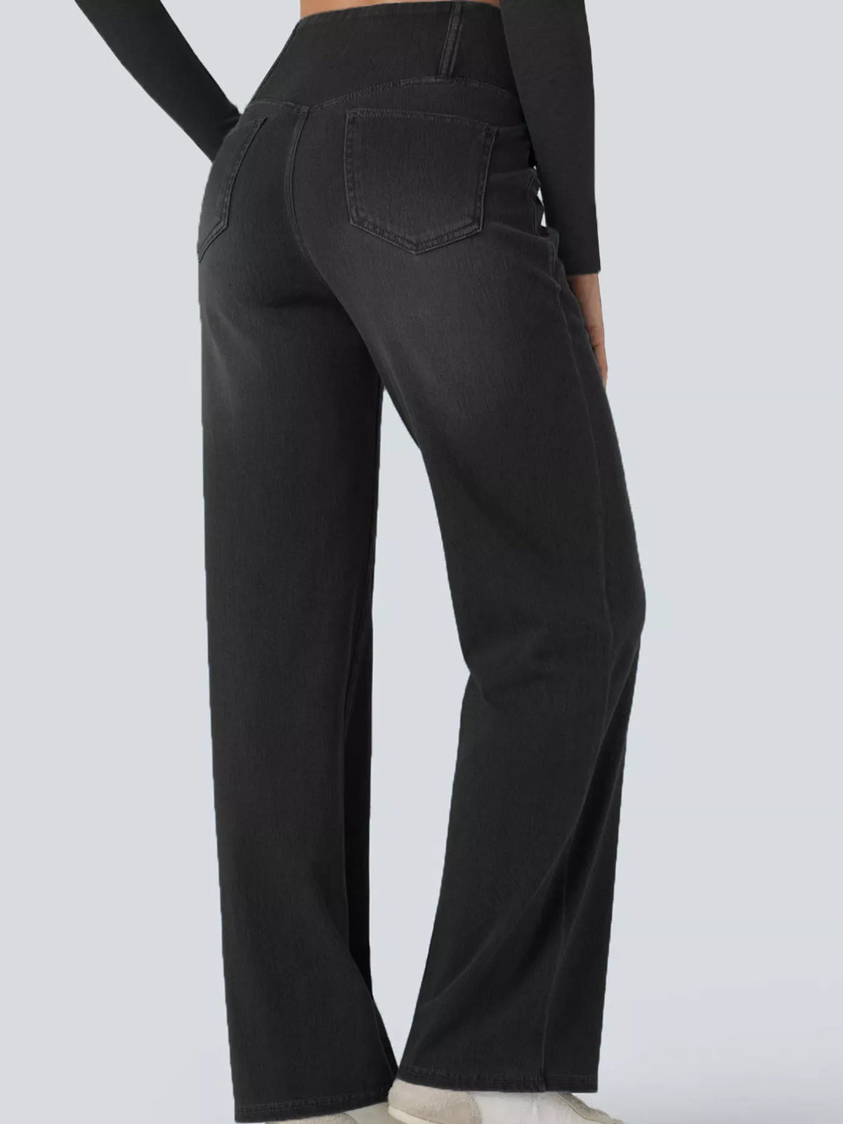 Black high-waisted crossover waistband straight-leg jeans — detail view