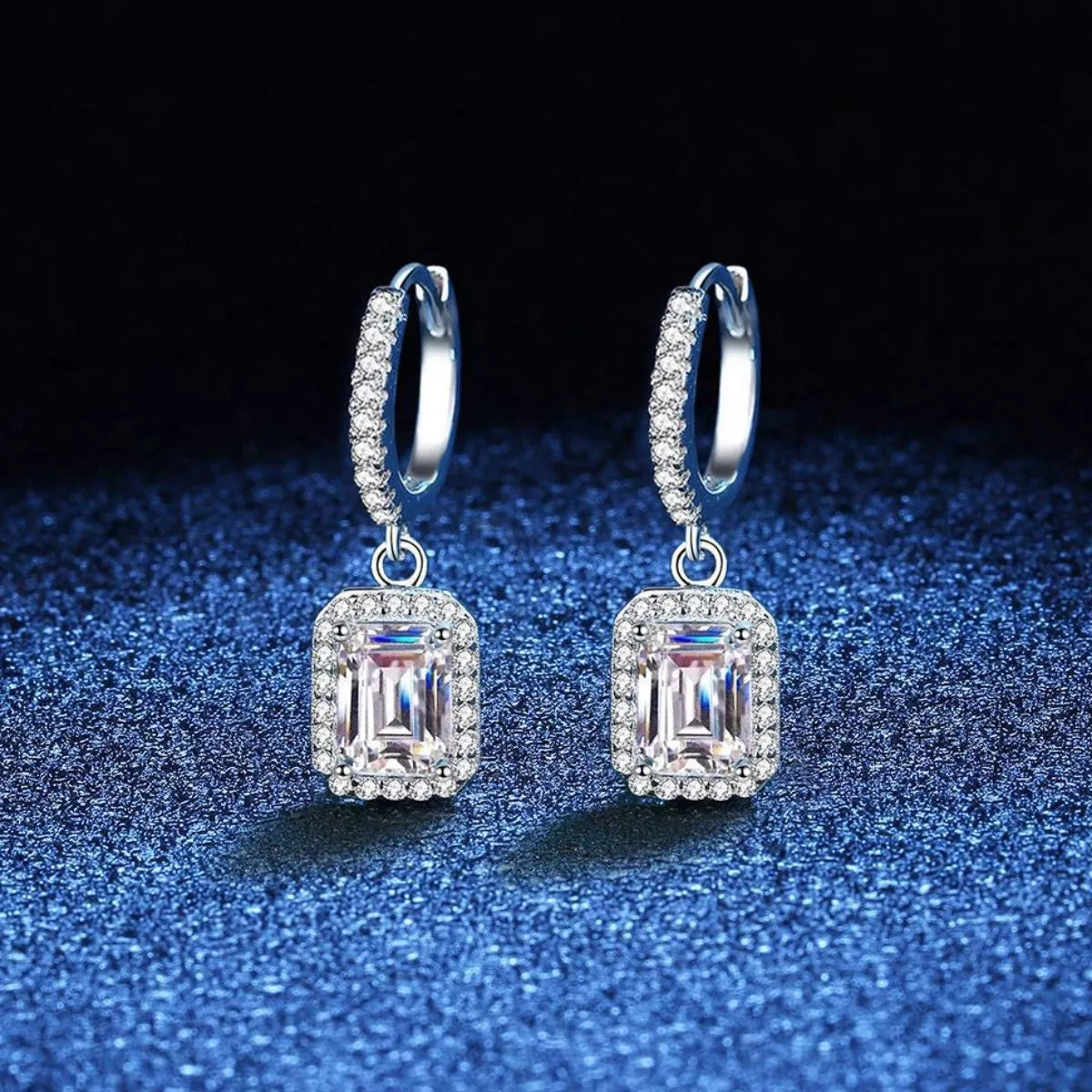 Silver-tone hoop earrings with rectangular halo stone drops — detail view