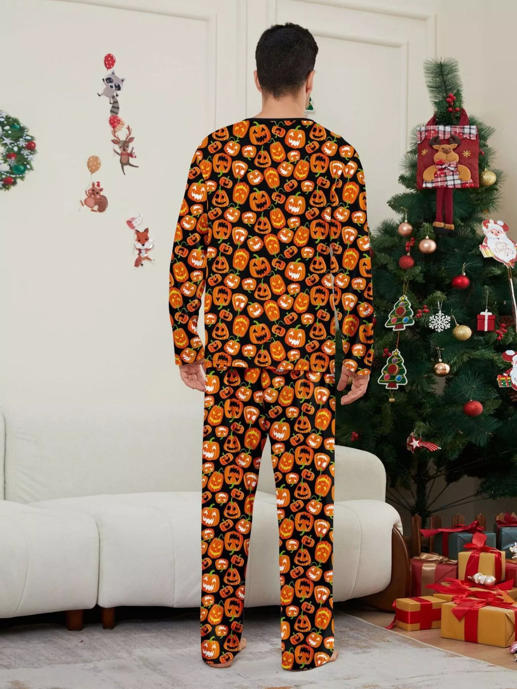 Back view of the men's allover pumpkin-print pajamas.