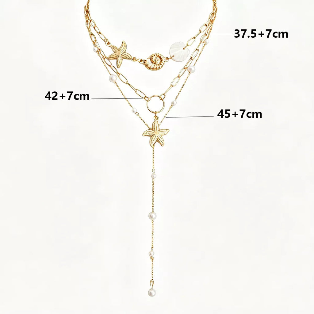 Measurements diagram for layered gold-tone necklaces with starfish and shell charms