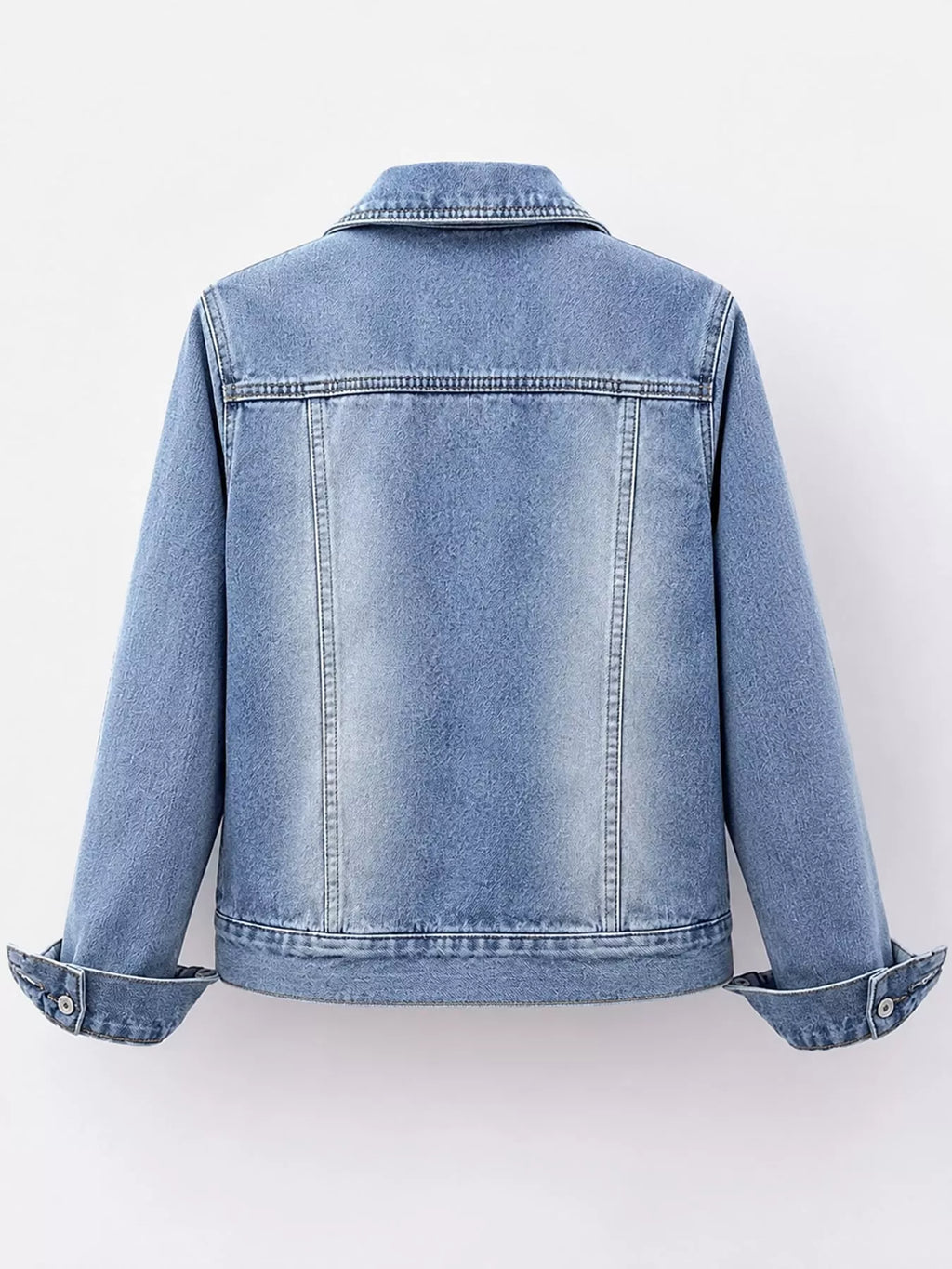 Back view of the light-wash denim jacket.