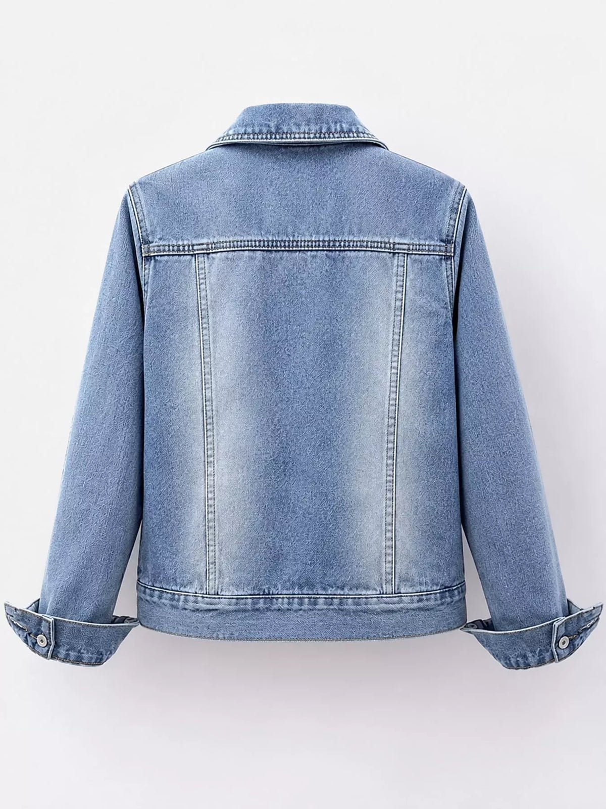 Back view of the light-wash denim jacket.