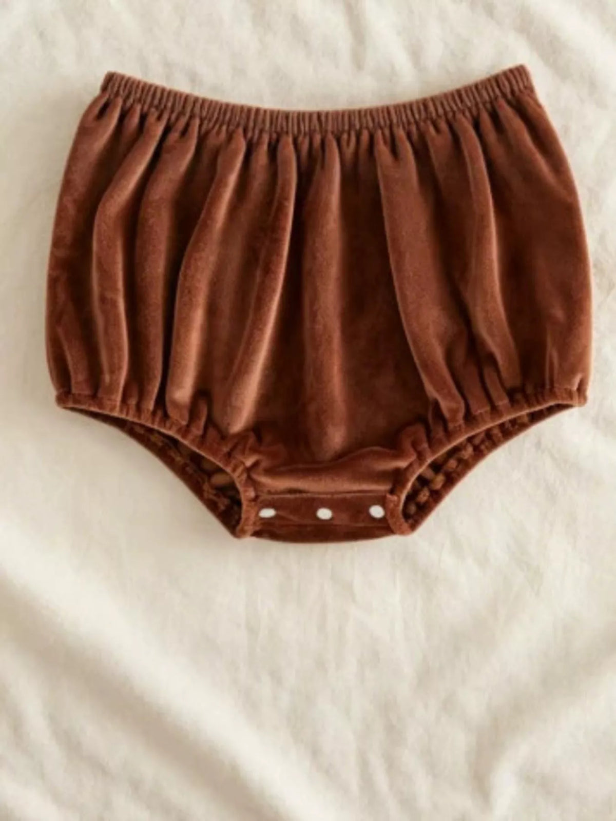 Brown velvet-look baby bottoms with elastic waistband and leg openings