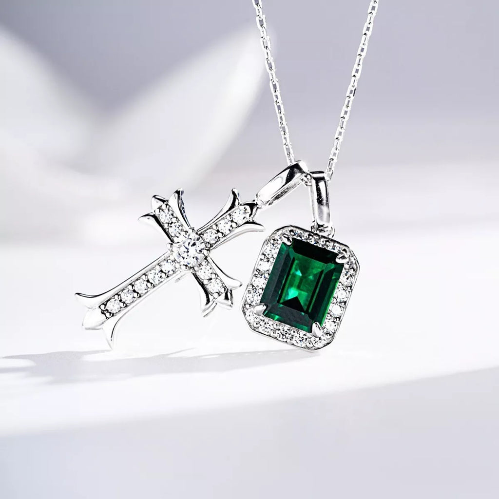 Silver-tone pendant necklace with a green rectangular stone