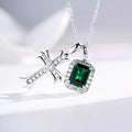 Silver-tone pendant necklace with a green rectangular stone
