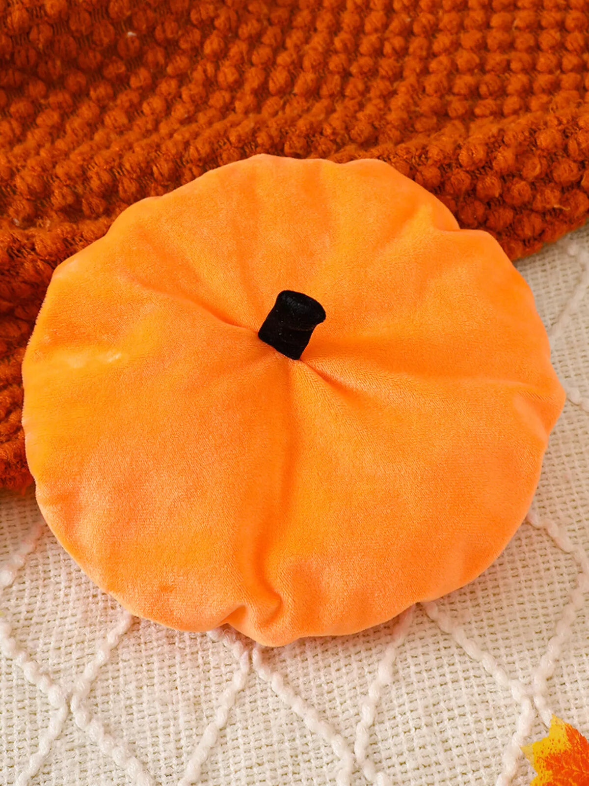 Orange beret-style baby hat