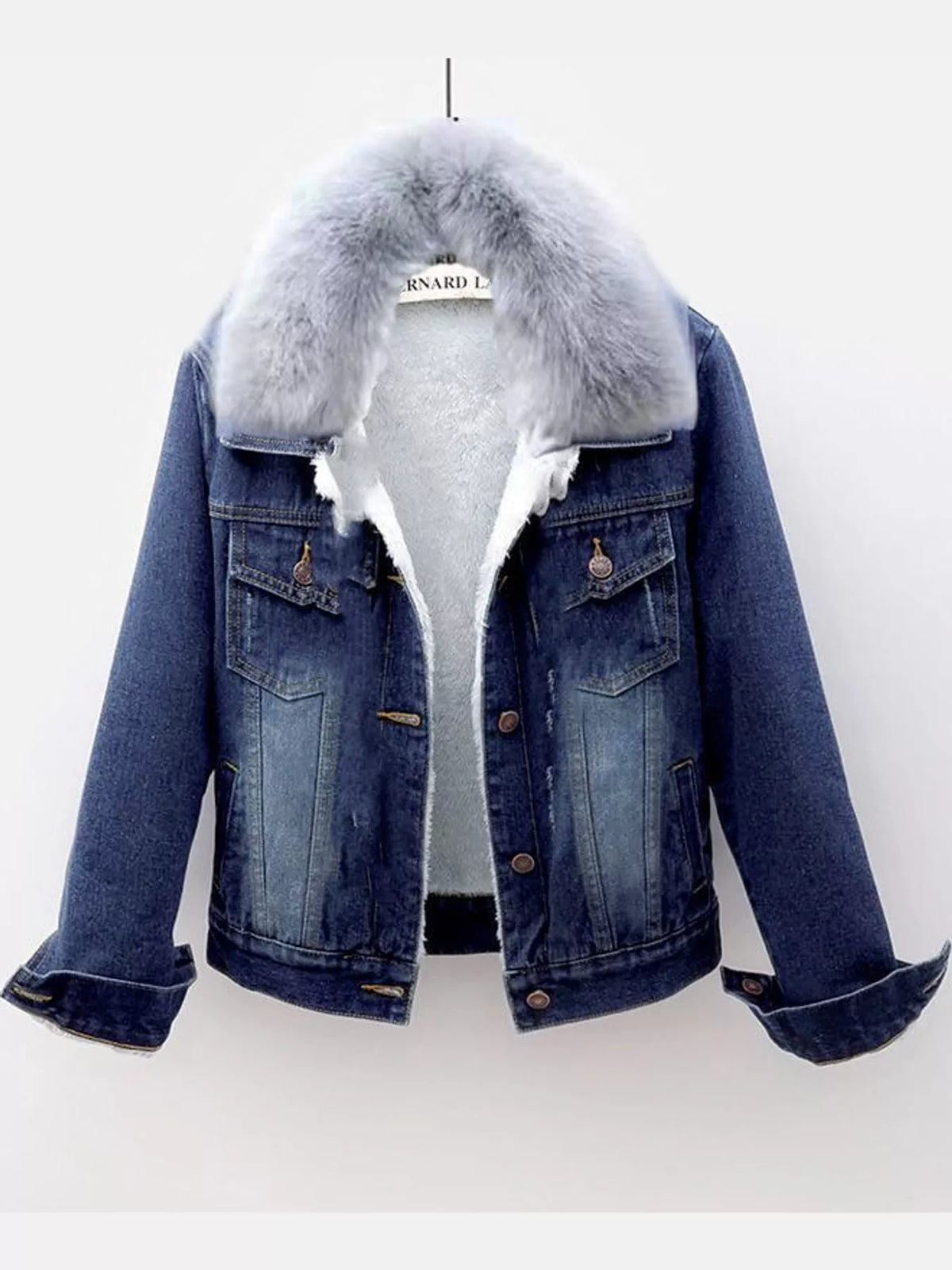 Dark-blue denim jacket with a fluffy gray collar and white lining.