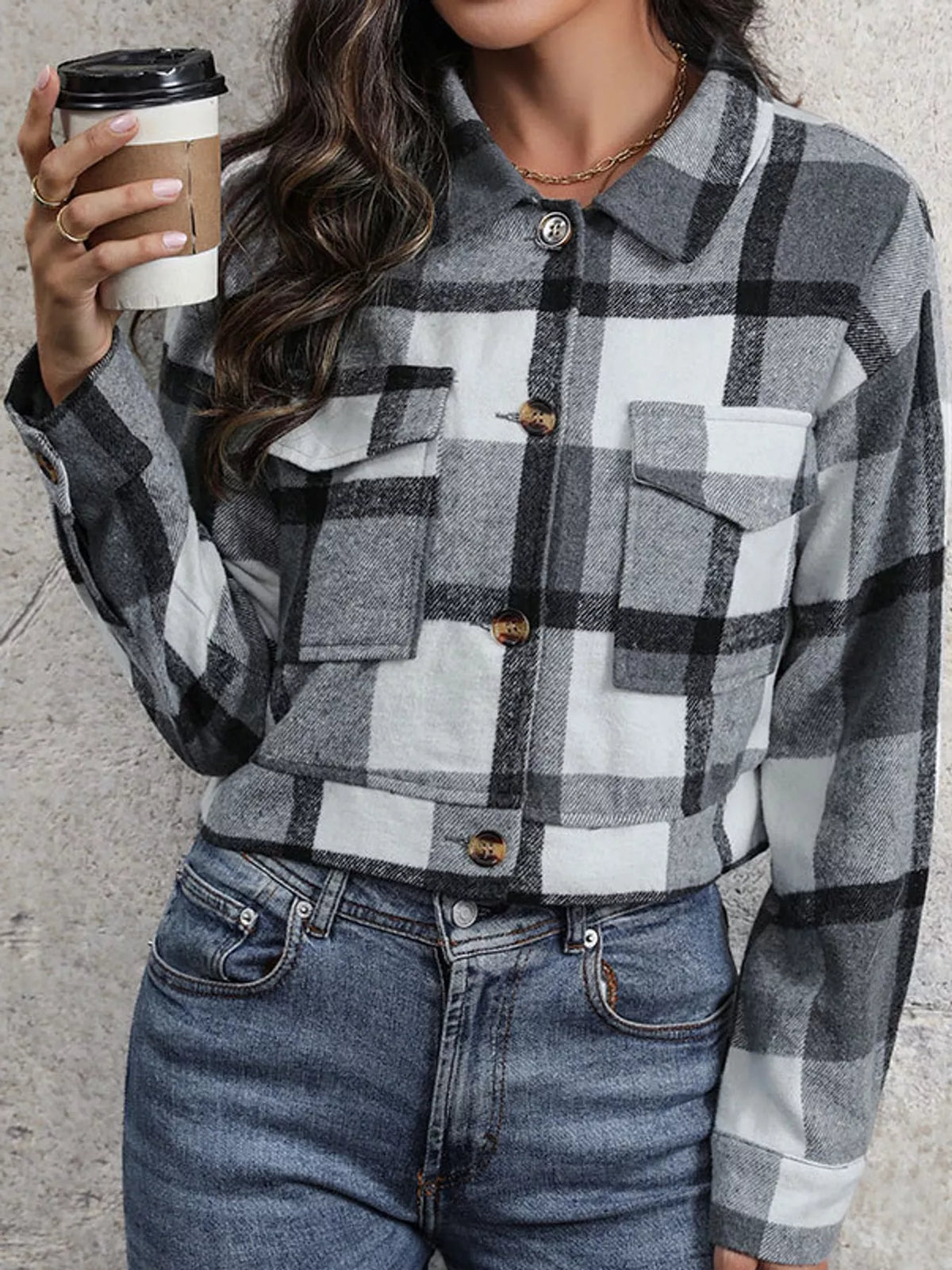 Gray color-block plaid cropped jacket with flap chest pockets, front view.