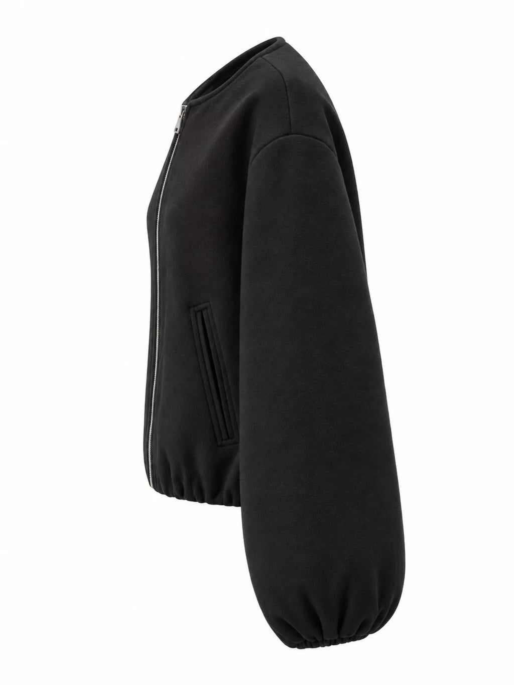 Black round-neck zip-up jacket with gathered hem and sleeves, side view.